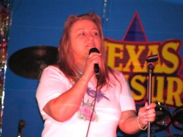 April

Daugher-In-Law Branda singing karaoke on a casino boat
Port Aransas, Texas 
  
   
